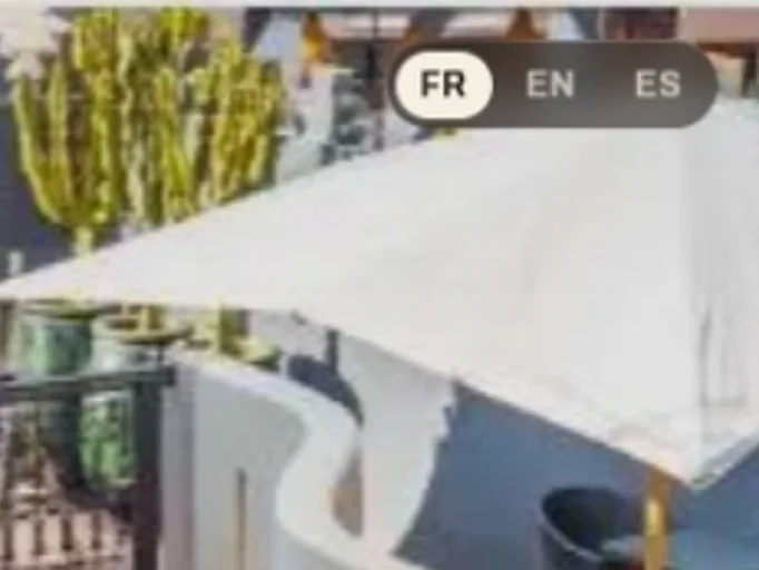 Sélecteur de langue du livret, en haut de la photo d’en-tête : français, anglais, espagnol
